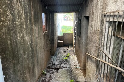 Lote com casa para venda no centro de São Lourenço Mg